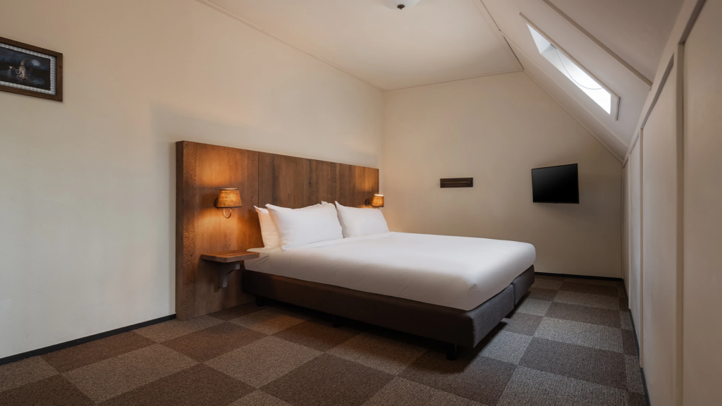 Ruime en comfortabele slaapkamer in de Boshoeve met meerdere bedden voor groepen